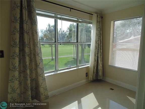 3rd image of 3380 Pinewalk Dr N APT 1128