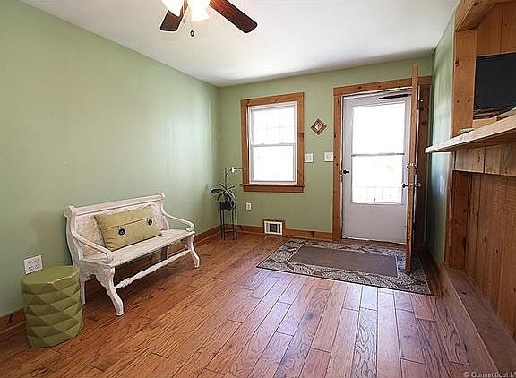 The side entrance brings you into the den/dining room depending on your preference.