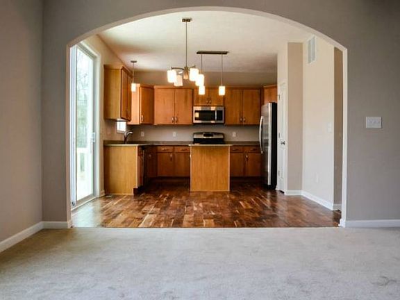 Dining room (14x9) connects the kitchen to the living room.
