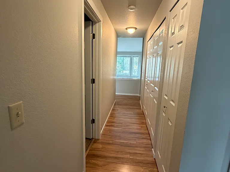 view to living room from bedroom entries
