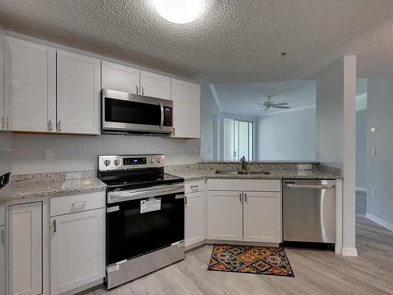 5601 Bentgrass Dr #10-113 — Photo 1
