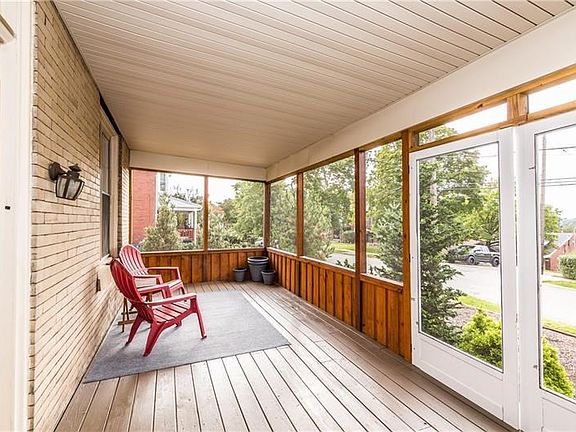 Large screened-in front porch.