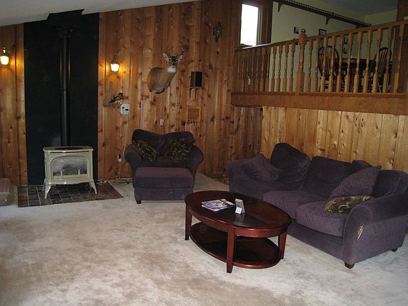 Living room looking up at dining room