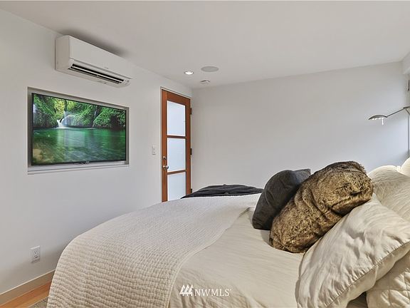 In the Primary Suite, you will see an exterior door that leads you to your private back dock. Plans are available to finish this area into an extra finished room.