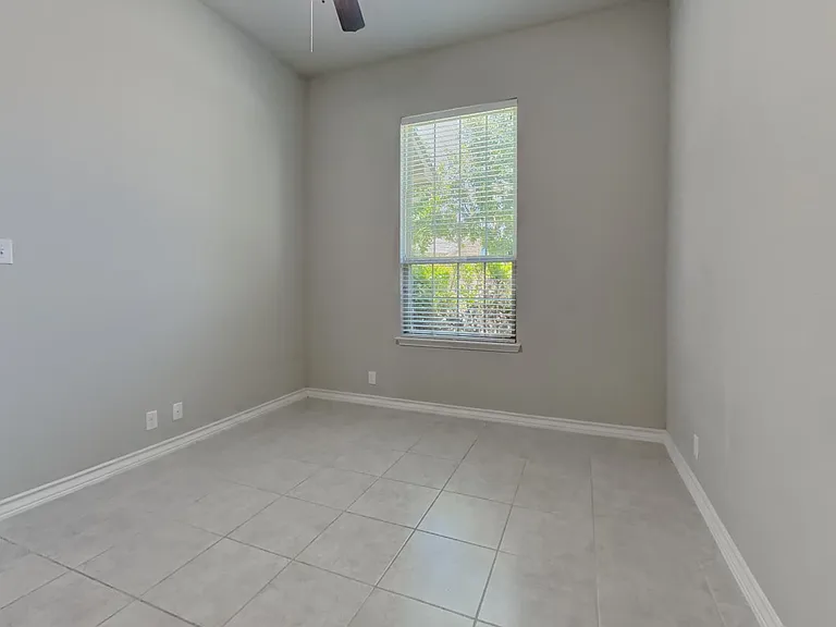 Brightly lit, spacious room wi