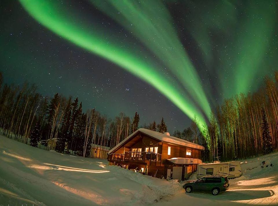 Warm home beneath the aurora