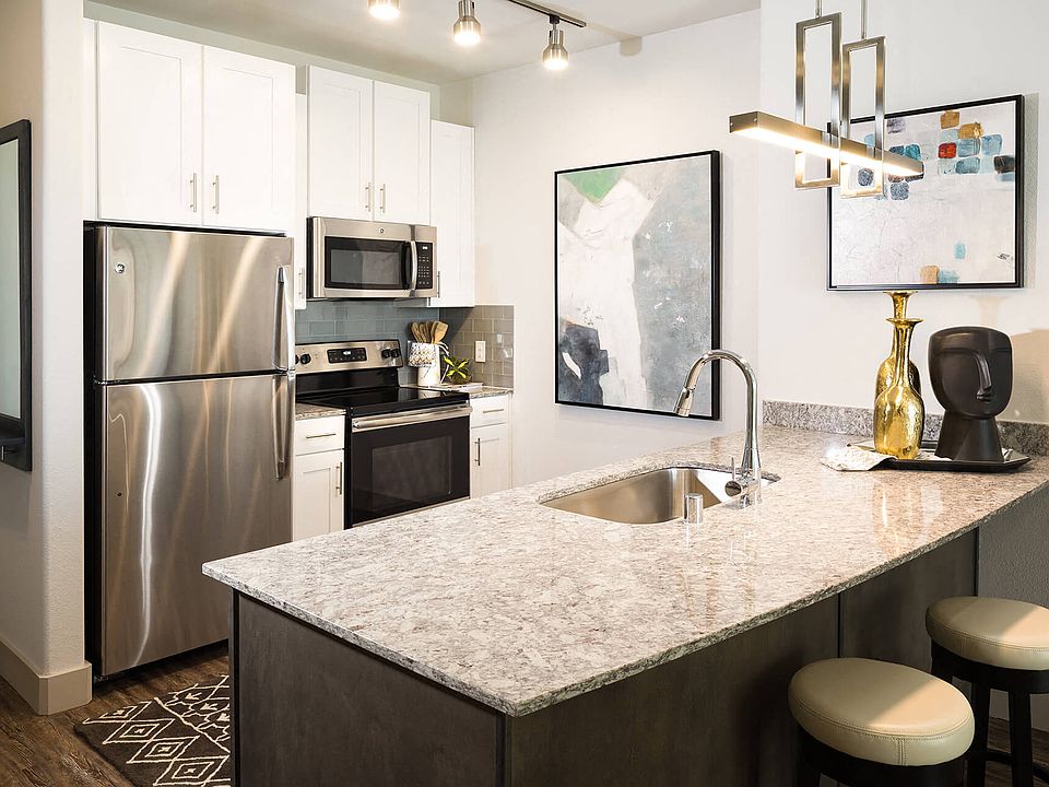Create culinary masterpieces in a gourmet kitchen, featuring CleanSteel appliances that combine style and performance.