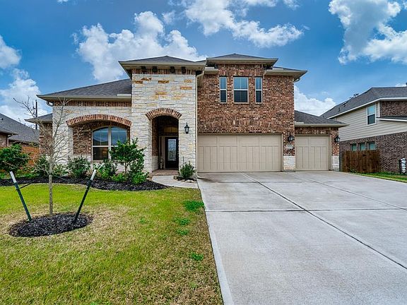 Built in 2018, this immaculate home offers a 3-car wide garage too!