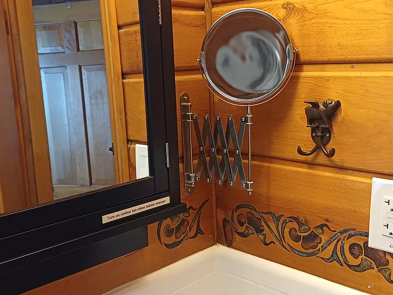 Bathroom detail. Intermittent stenciling appears elsewhere, as well.