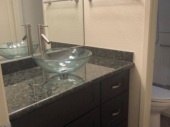 Bathroom Area: Updated sink and cabinet area