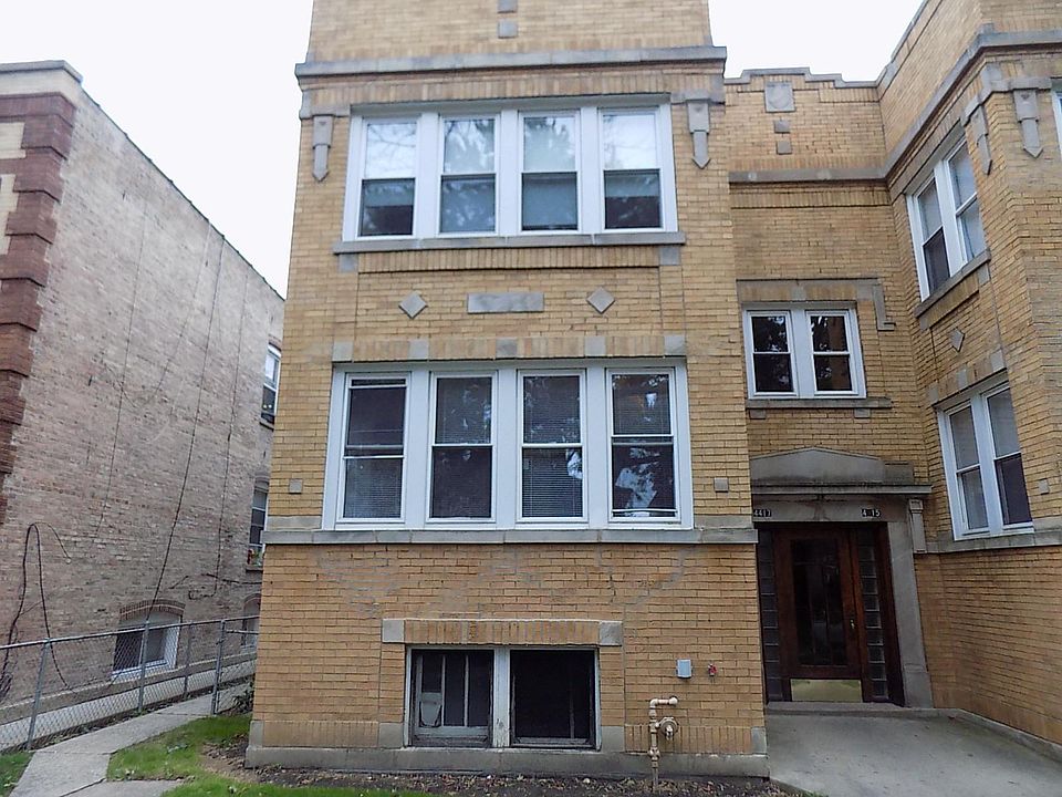 Front of building, unit located in the rear facing north and east. Lots of natural light.