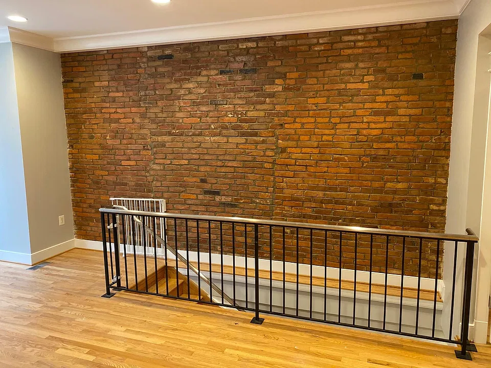Living room, stairs to lower level.