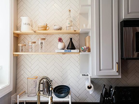 Sunny kitchen with stainless steel appliances