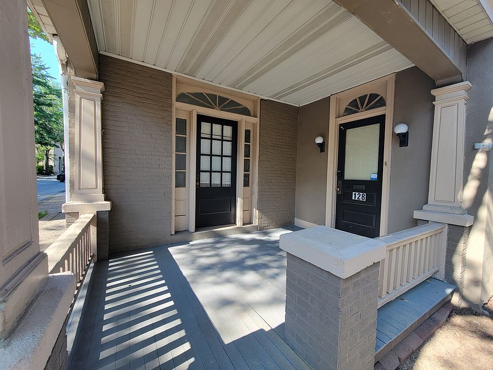 Front porch with separate entrances to the sitting room and living room