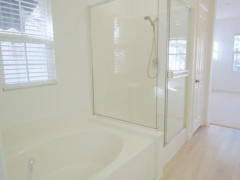 Master bathroom has separate shower and tub