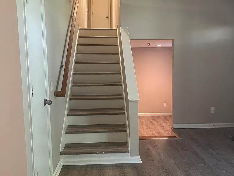 View from living room - right door to bonus room - left stairs to bedrooms