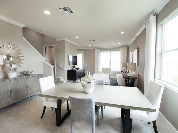 Model Representation Bright cafe dining space ideally located off kitchen gathering spaces, great