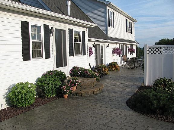 large deck adjoining pool