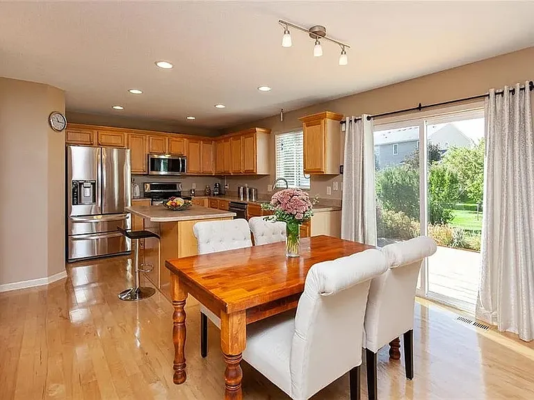 Kitchen is actually the same light sage color as the living room.