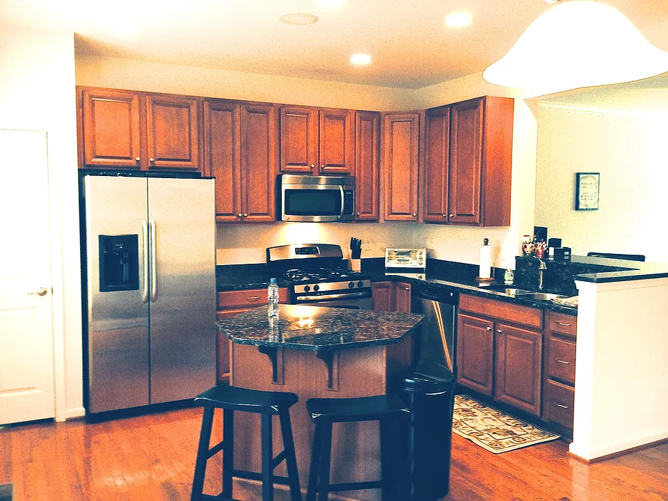 Well-appointed kitchen with deck and dining area.