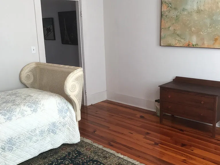 Bedroom 1-view of dresser and doorway