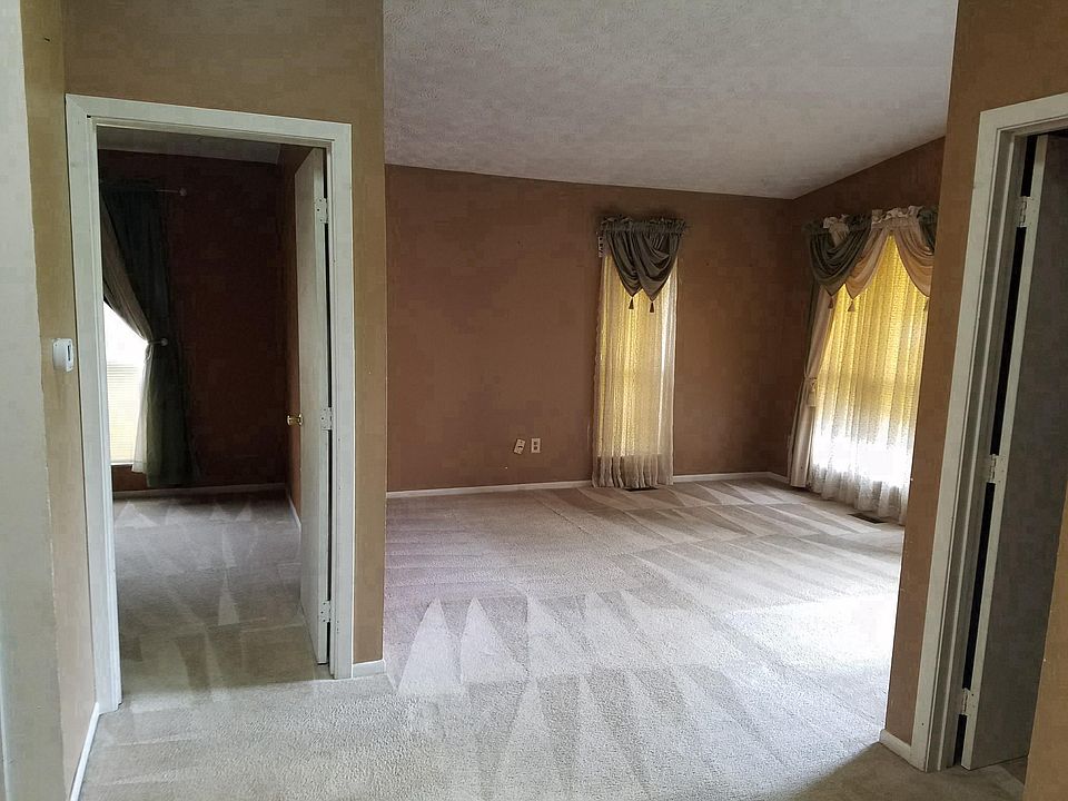 Upstairs view from kitchen. You can see both bedrooms locate