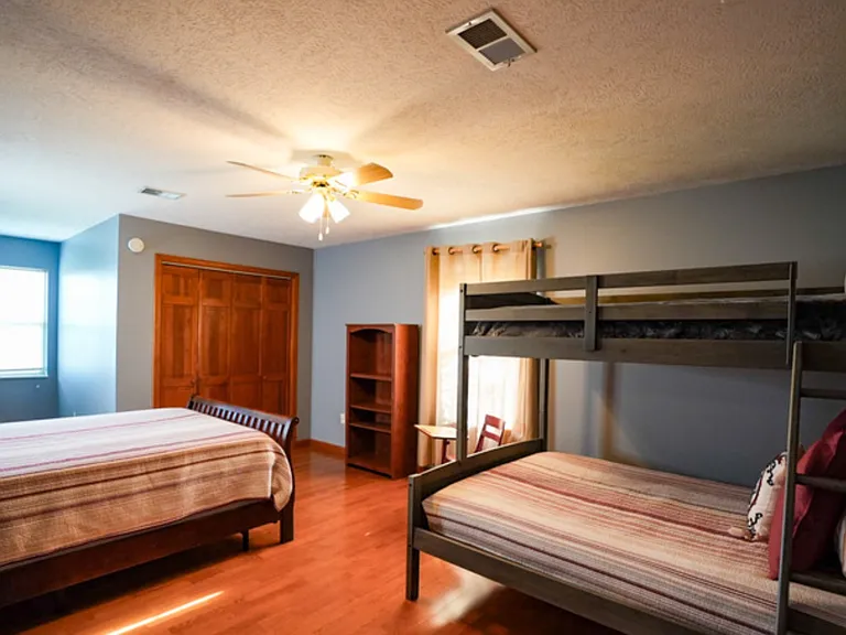 Second floor bedroom, with queen bed and bunkbed (full bottom bunk and twin top bunk)