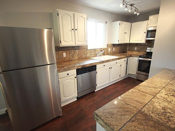 Granite countertops and stainless steel appliances