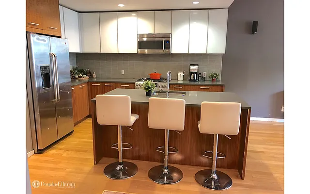 Sold by Douglas Elliman | media 18