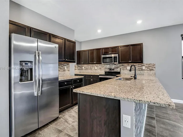 3440 W 100th Ter — Photo 22