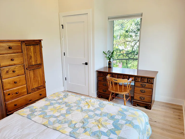 Front bedroom with blackout blinds.
