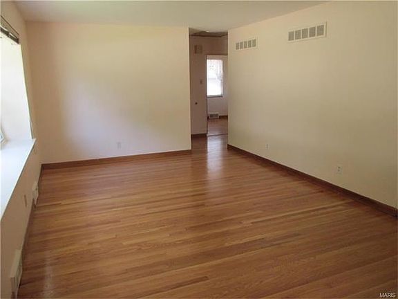 Beautiful Refinished Hardwood Floors in Living room