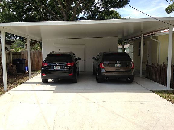 Carport w/ attached storage