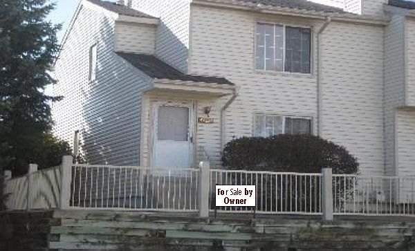 Townhome from street : End unit, great neighbors, Great park nearby - and in Cherry Creek Schools.