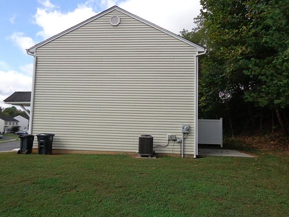 Right side of property showing rear patio