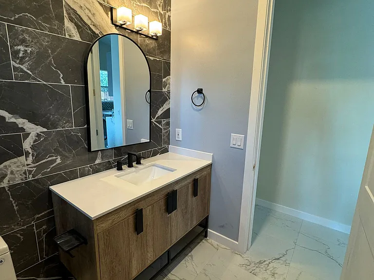 Guest bathroom. 10' ceilings.