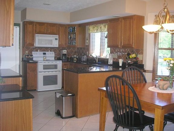 Kitchen with new Zodiac counters and granite sink