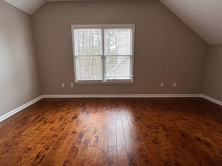 Extra Large Upstairs Bedroom over the Garage with Large Storage Closet for storage (not pictured) and extra hang up clothes as well as small cubby storage closet seen in next picture. See Next Picture for extra view of space in this amazing room!
