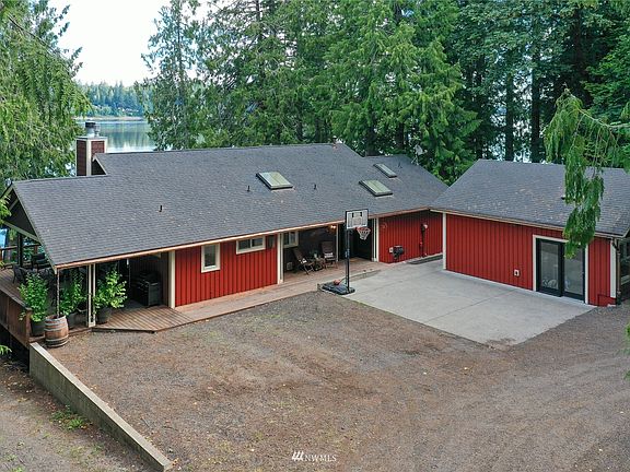 Drone view of the main house and studio/shed. >