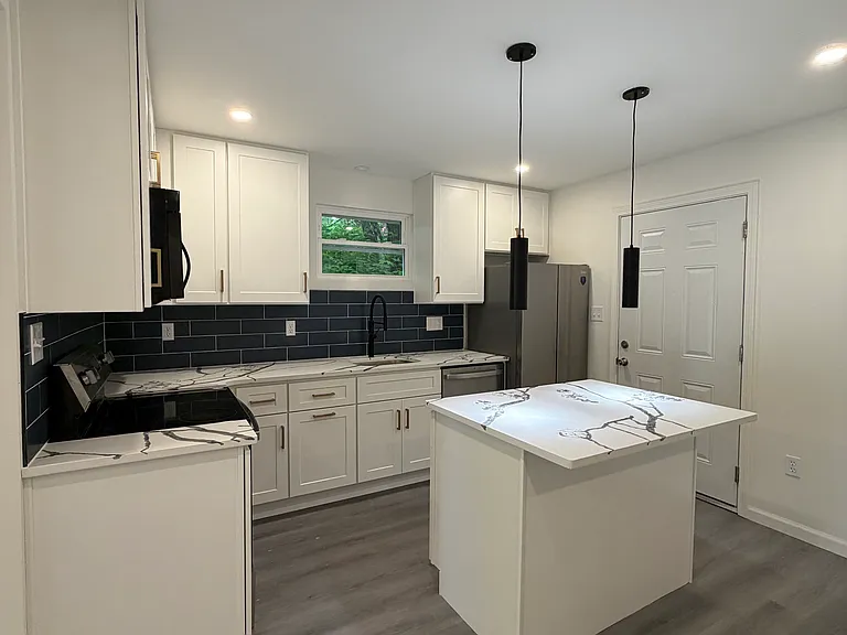 311 Akron Ave — Photo 5