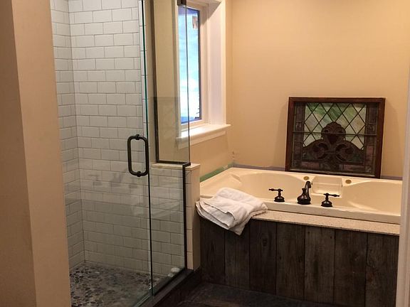 Spa tub and tiled shower