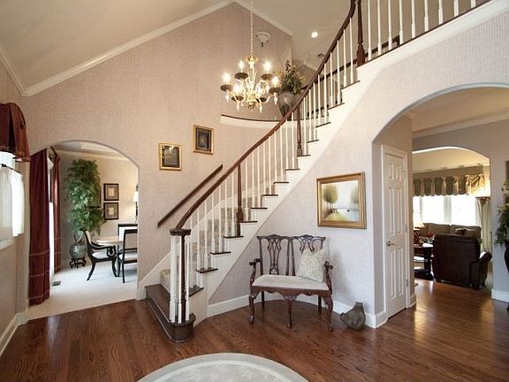 Entryway has hardwoods