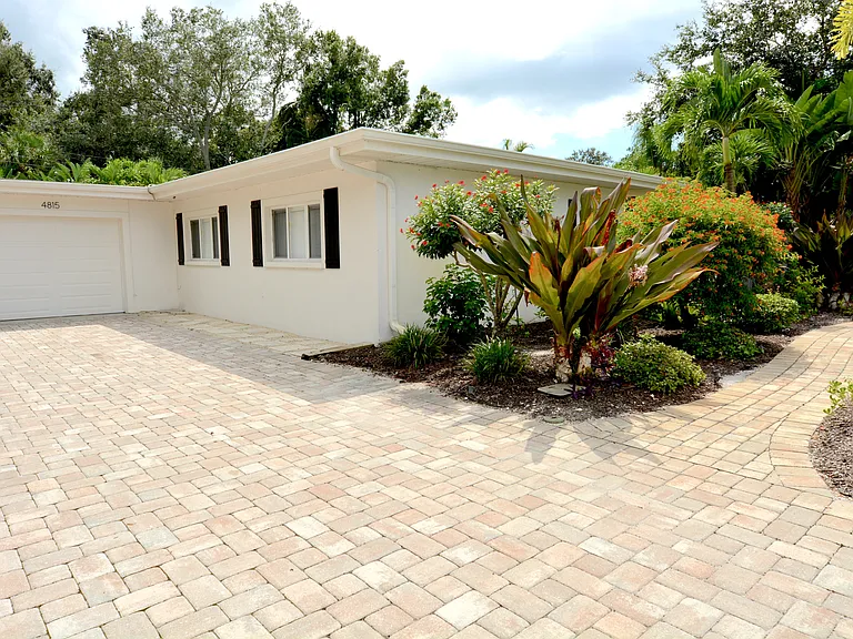 Large driveway with garage