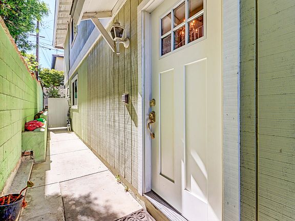 Front Door and Private Path To Backyard