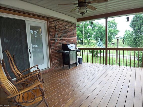 Relaxing metal roof covered 16 x 12 porch