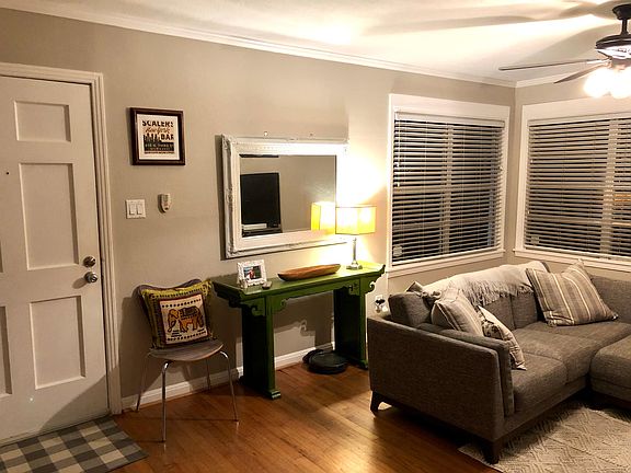 Flexible living and dining space with multiple configuration options.