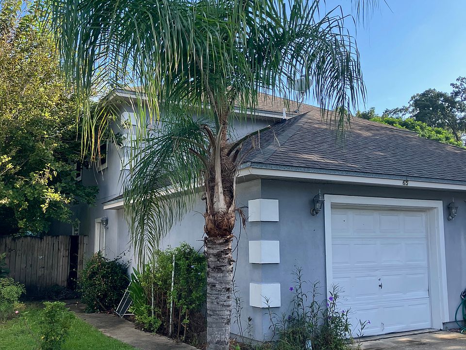 Front entrance with oversized garage with new opener.
