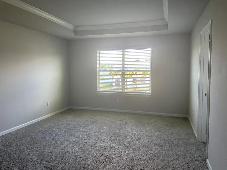 Master bedroom w/ water view