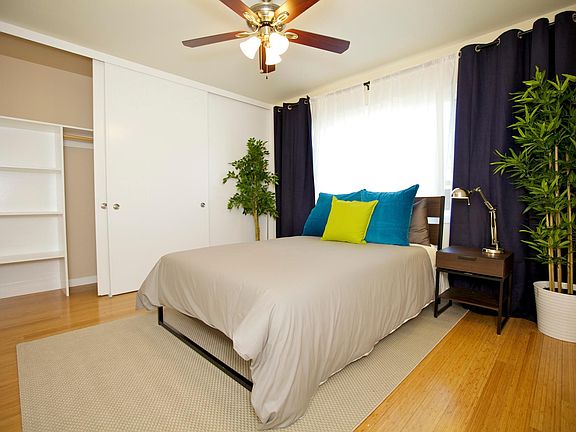 Large bedroom with huge wall to wall closet space