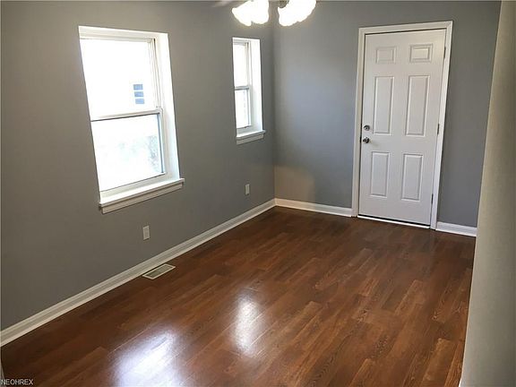 Separate dining room with tons of light, leads to back deck
